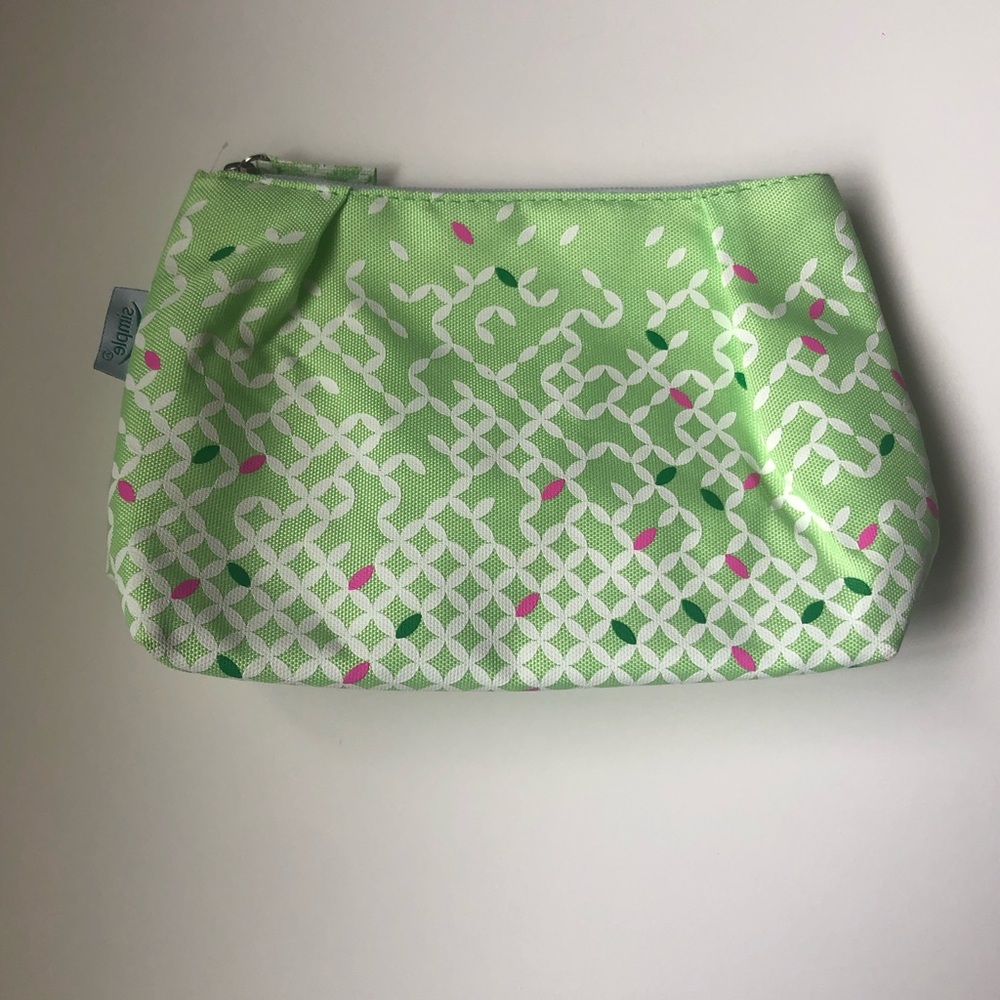 Green and white printed cosmetics bag.